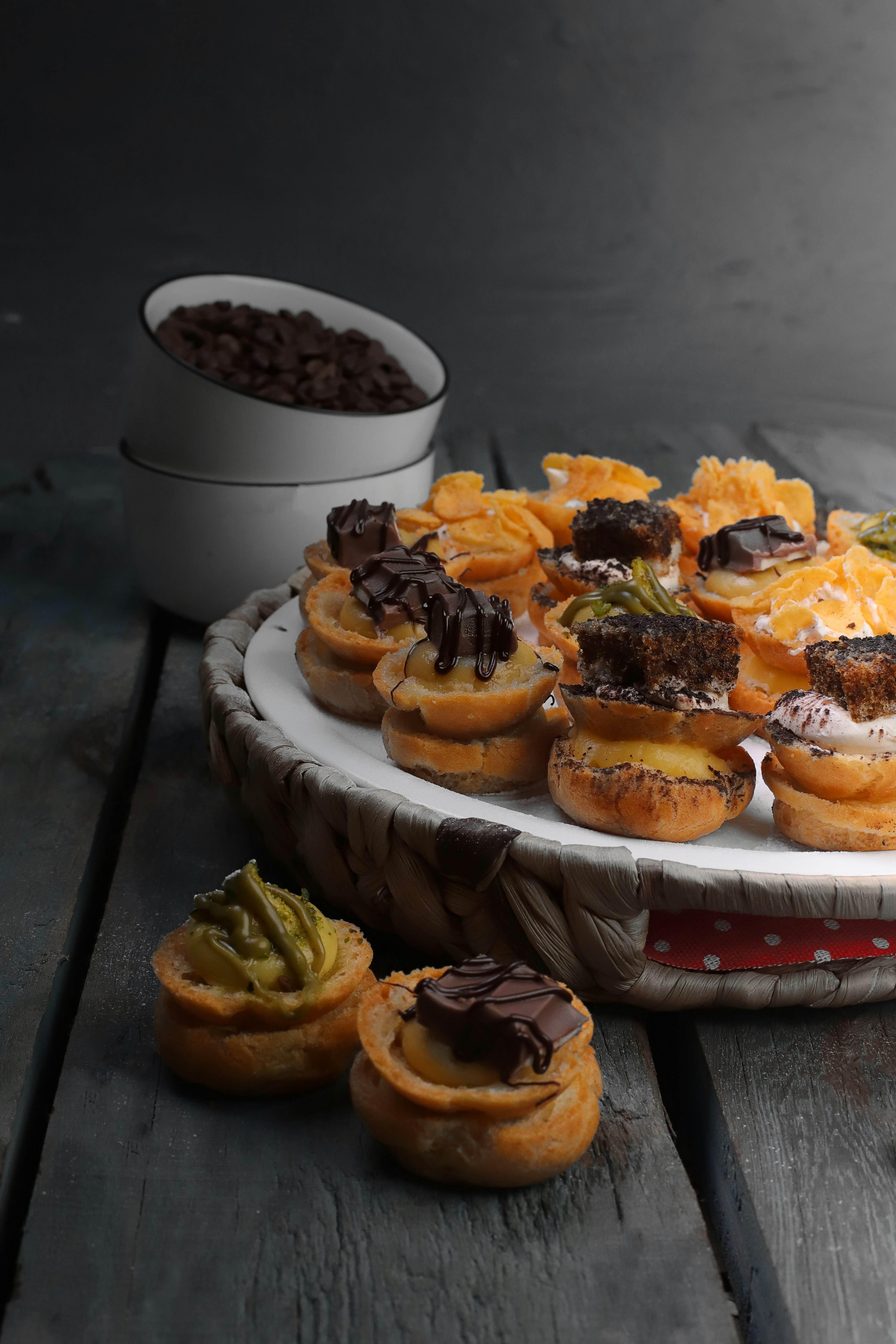 brown and white cupcakes on white ceramic plate